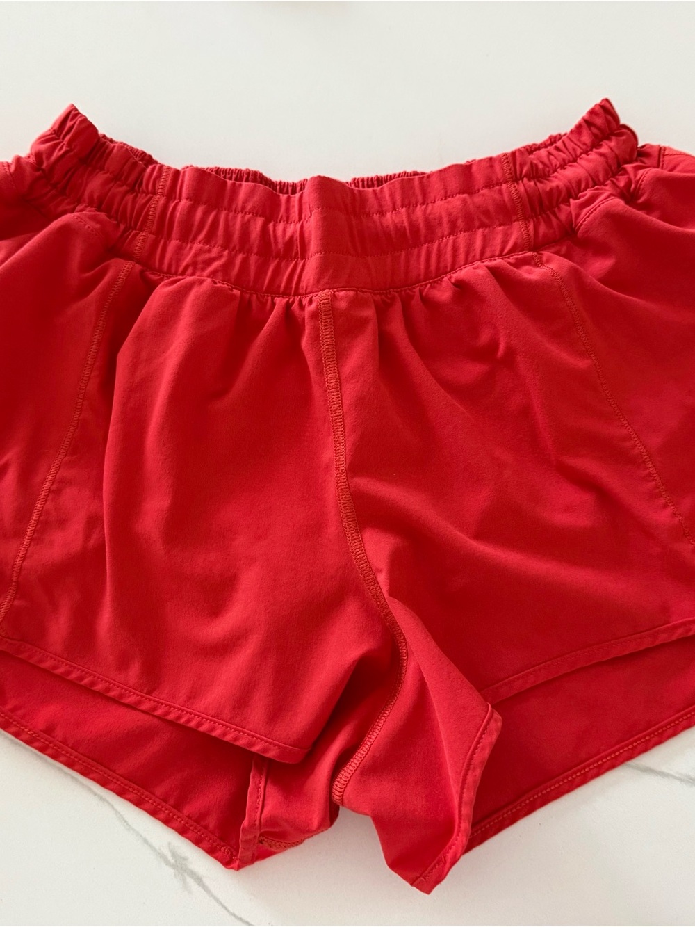 Womens lululemon Red Athletic Shorts. Bitty hot 2.5”